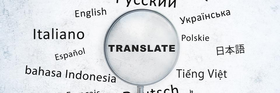 A magnifying glass with the word translate in the center, with different languages around it.