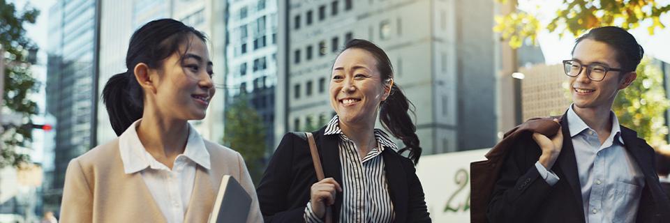 A group of happy investors taking advantage of set-aside visas by investing in a targeted employment area regional center project.