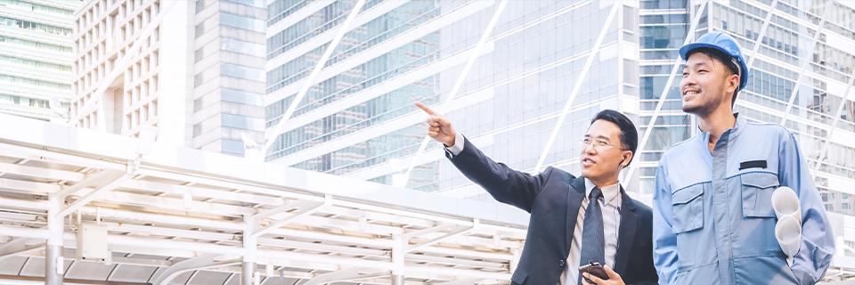 Foreign investors on a regional center infrastructure projects site.