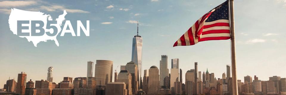 EB5AN logo next to a city skyline and American flag.