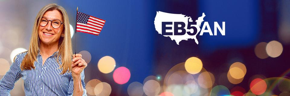 A person holding up an American flag next to the EB5AN logo.