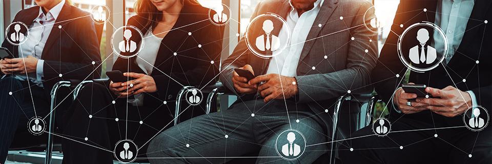 A group of people sitting in chairs and checking their phones, with employee/workforce network icons in the foreground.
