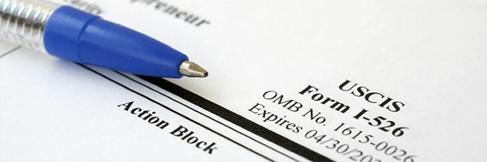 A close-up of USCIS's Form I-526, Immigrant Petition by Standalone Investor.