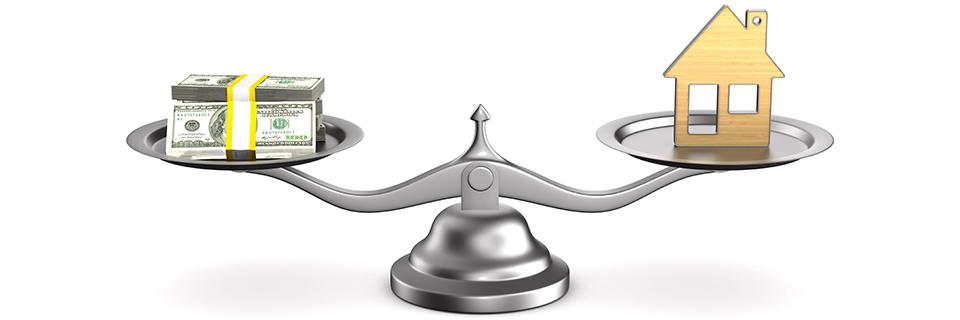 A silver scale with money on one side and a house icon on the other, alluding to significant development through capital invested.