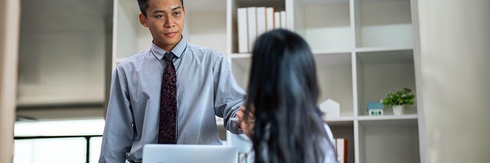A person shaking hands with a person
