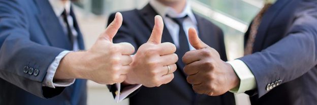 A group of EB5 investors giving a heads-up to the camera.