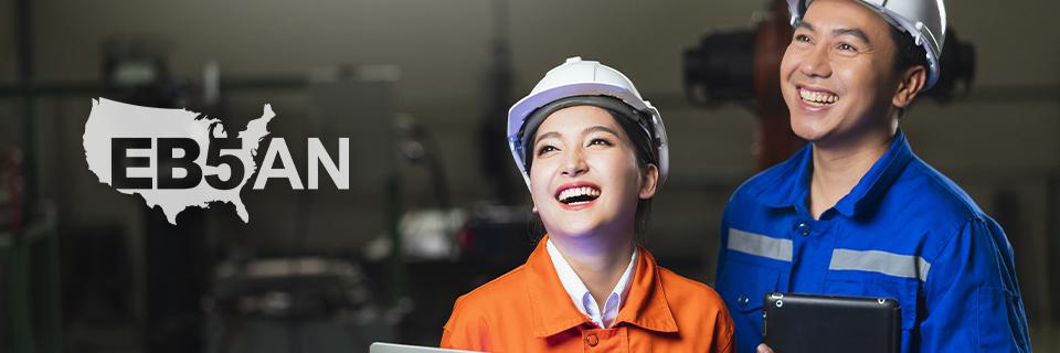 Two H1B workers in hard hats who adjust status to EB5, next to the EB5AN logo.