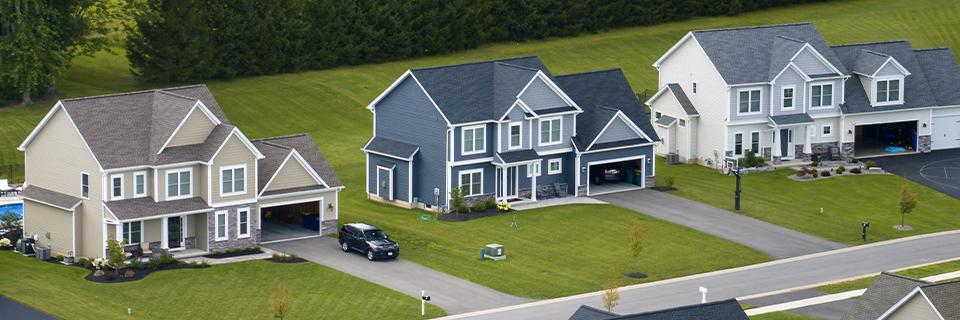 Side by side houses as part of a real estate development plan.