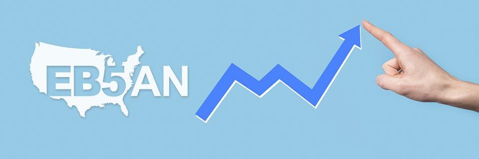 The EB5AN logo next to an upwards arrow and a hand pointing at it. EB5AN has a stellar repayment track record.