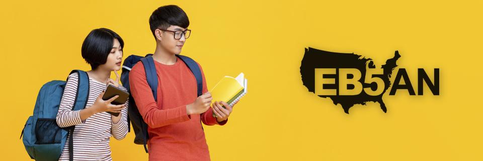 Two foreign students looking at school notes next to the EB5AN logo.