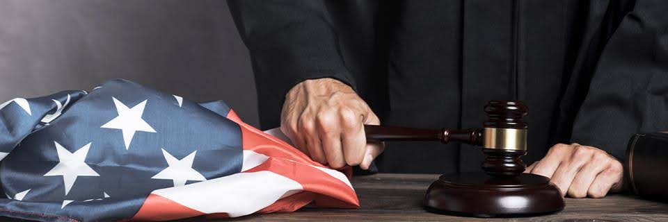 A group of F1 visa holder students at their graduation ceremony.