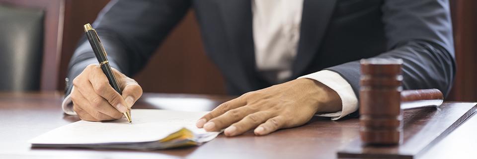 An EB5 immigration attorney working on an immigrant visa petition.