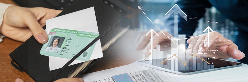 Eb5 investor holding a Green Card document beside financial charts representing visa strategy and U.S. investment planning.