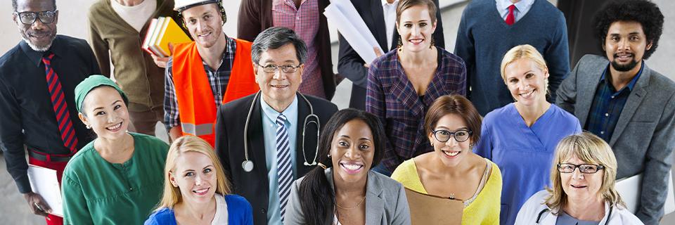 Group of skilled professionals from various industries representing typical employment-based Green Card applicants and potential EB5 investors.