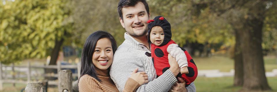 Smiling immigrant family enjoying life in the United States after receiving residency through the EB5 program or family sponsorship.
