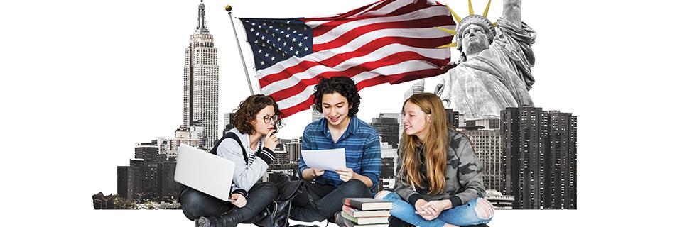 International STEM student in the U.S. using a laptop outdoors, exploring EB5 visa options for career growth and permanent residency.