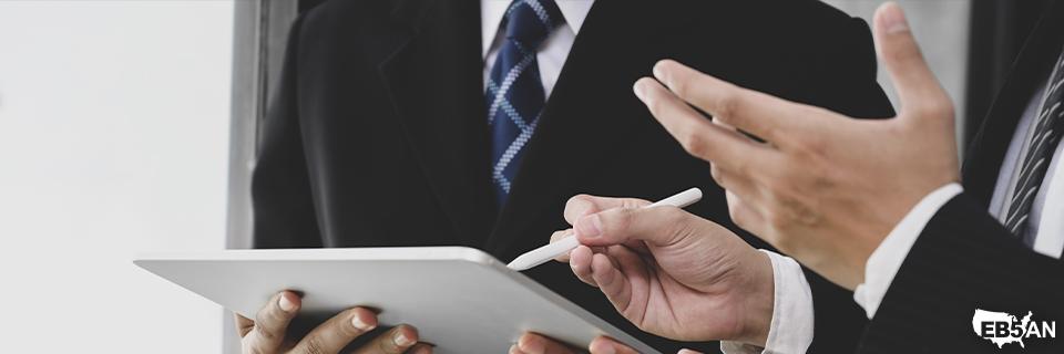 EB5AN advisors discussing project risk and job creation strategies with an investor, showcasing expert EB5 investment guidance.