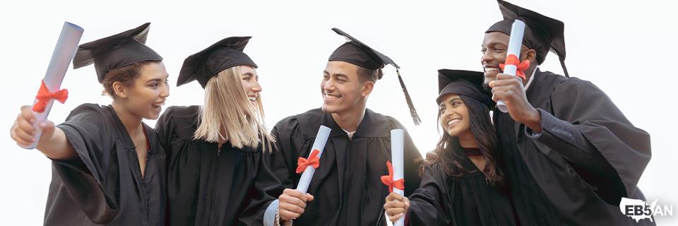 Group of diverse international graduates celebrating with diplomas in hand, showcasing the successful outcome of securing U.S. permanent residency through EB5 with the help of EB5AN.